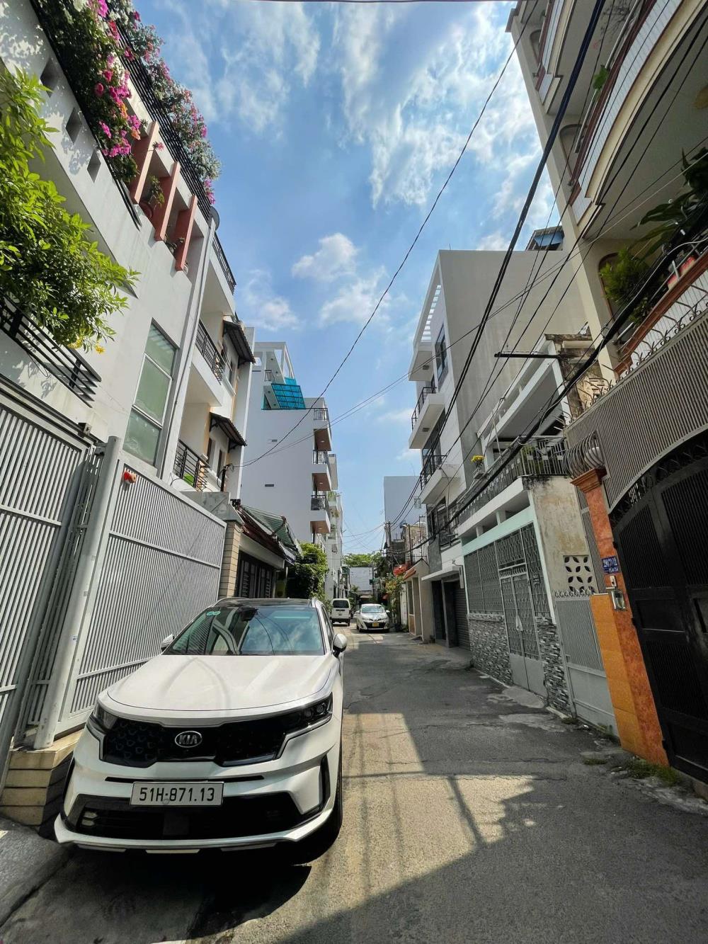 Nhà 4 tầng 6 phòng ngủ Nơ Trang Long, Bình Thạnh 70m² giá 12 tỷ - Hẻm ô tô tránh