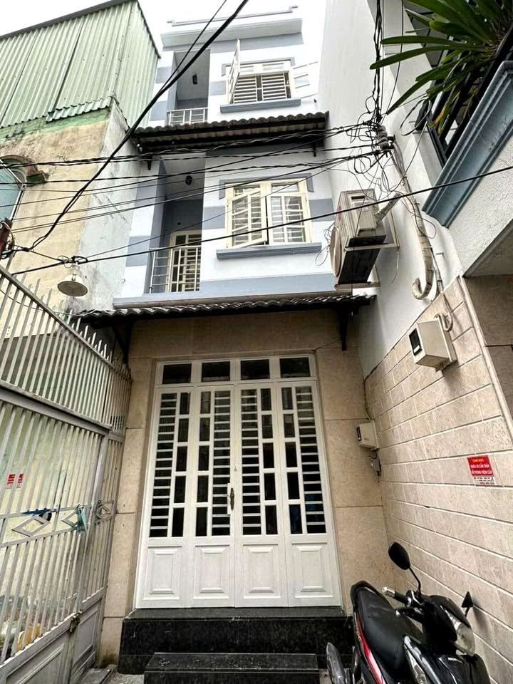 Nhà nguyên căn Vĩnh Khánh, Q.4, 21m² giá 7.5 triệu - Thích hợp cho gia đình và sinh viên!
