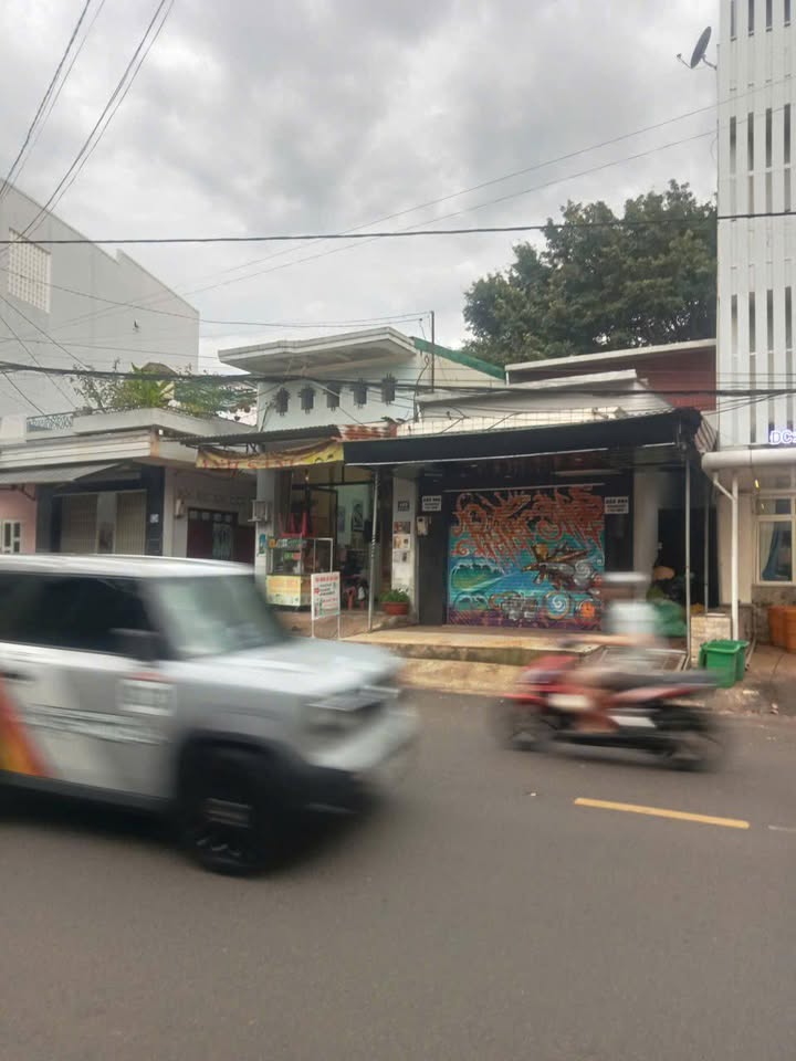 Nhà cấp 4 mặt tiền đường Quang Trung Buôn Ma Thuột 99m² giá 5.7 tỷ - Sổ đỏ chính chủ!