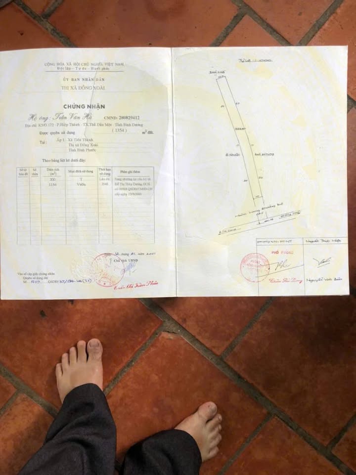 Nhà cấp 4 mặt tiền Quốc lộ 14, phường Tiến Thành, 1400m² - Cơ hội vàng cho đầu tư!