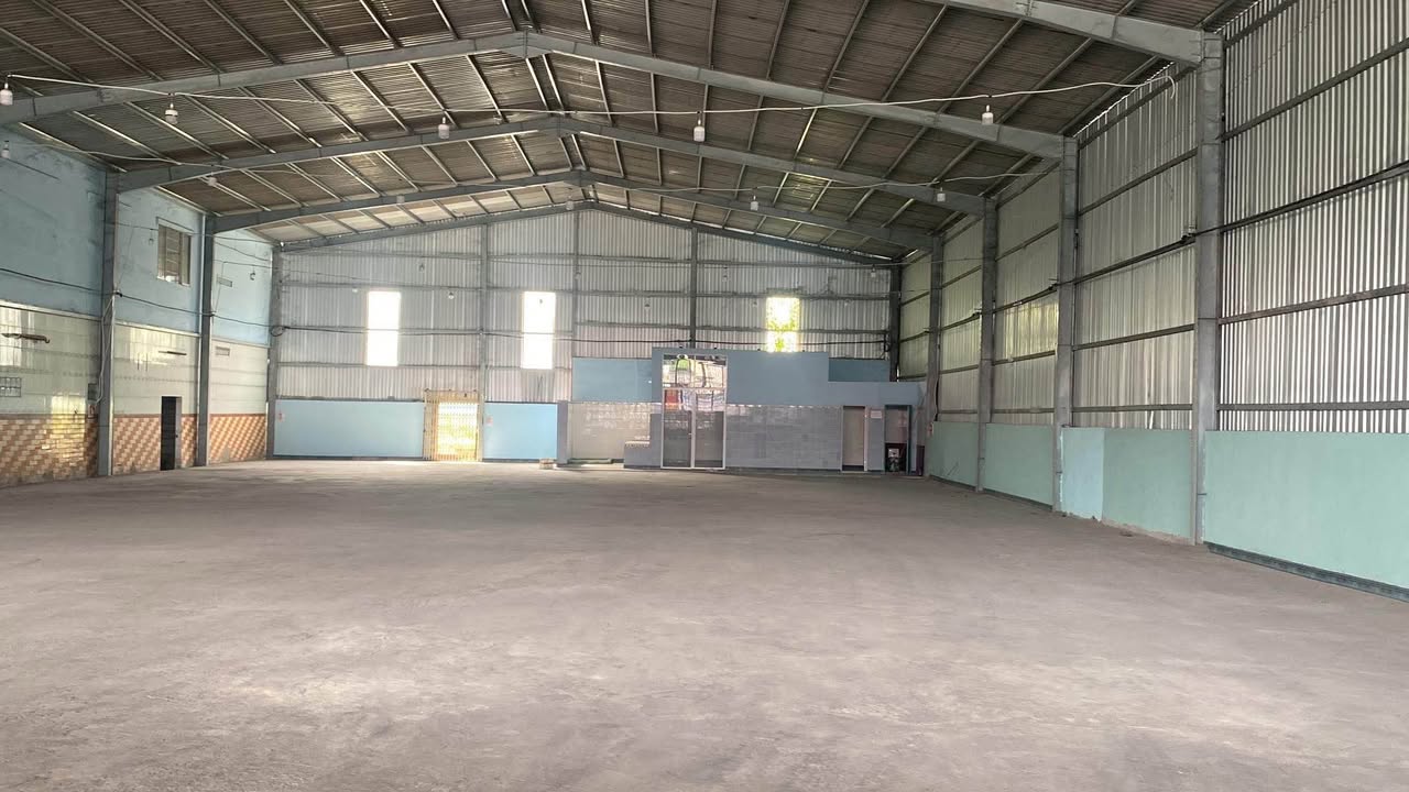 Kho cho thuê mặt tiền Quốc lộ 1A Cái Bè 1400m² - Sân đậu container tiện lợi!