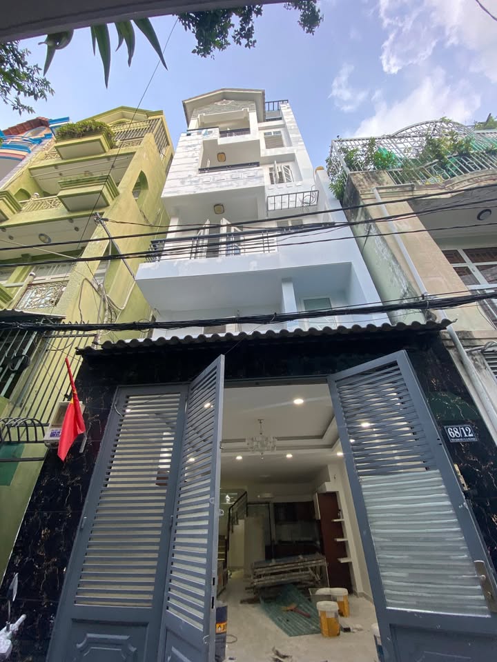 Nhà nguyên căn hẻm xe hơi Thích Quảng Đức, Phú Nhuận 58m² giá 30 triệu - Khu vực kinh doanh sầm uất!