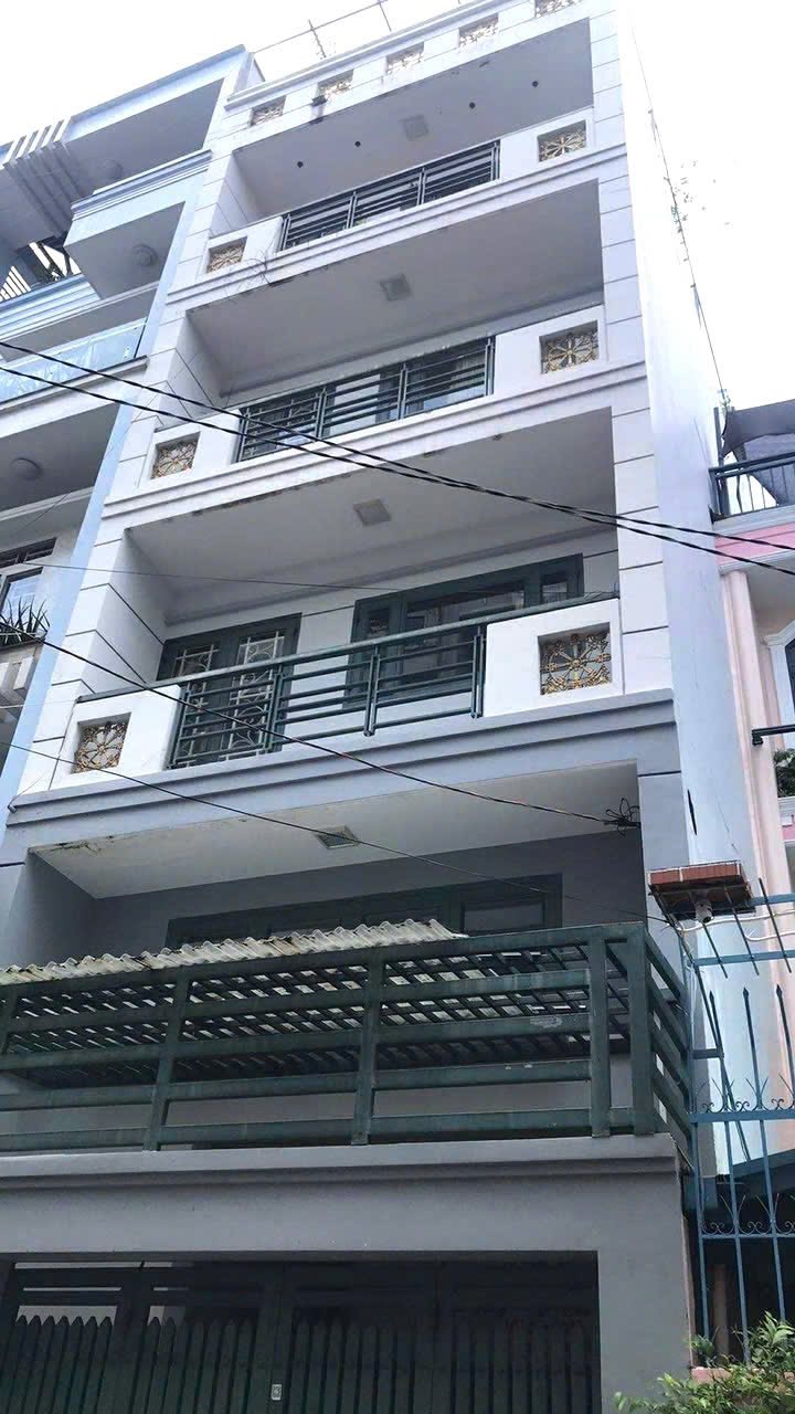 Cho thuê nhà phố 100m² tại Tân Bình - Thiết kế 10 phòng ngủ, thang máy mới