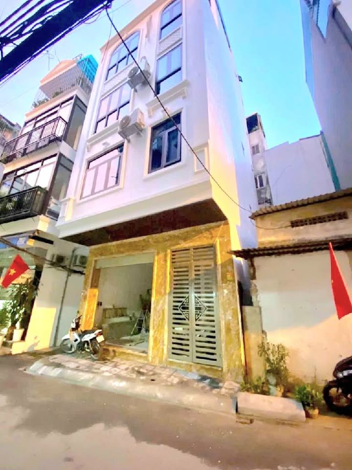 Nhà Phố Đống Đa 51m² - 6 Tầng Thang Máy - Gara Ô Tô - Giá Chỉ 19.8 Tỷ