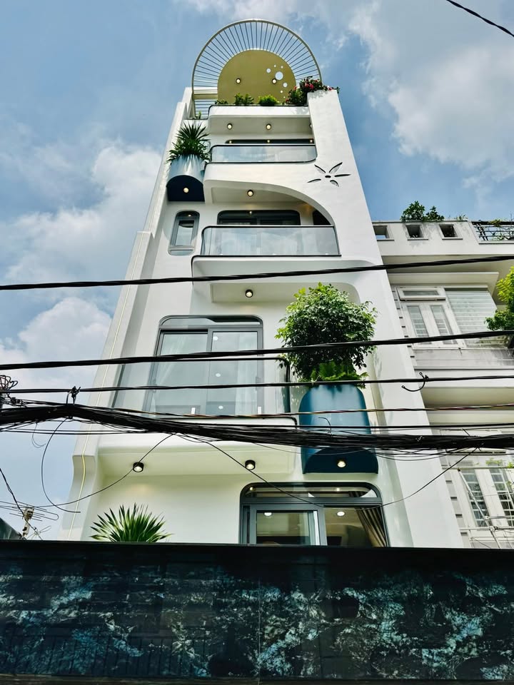 Nhà phố cao cấp Bùi Quang Là, Gò Vấp 68m² giá 13.5 tỷ - Thang máy, ô tô ngủ trong nhà!