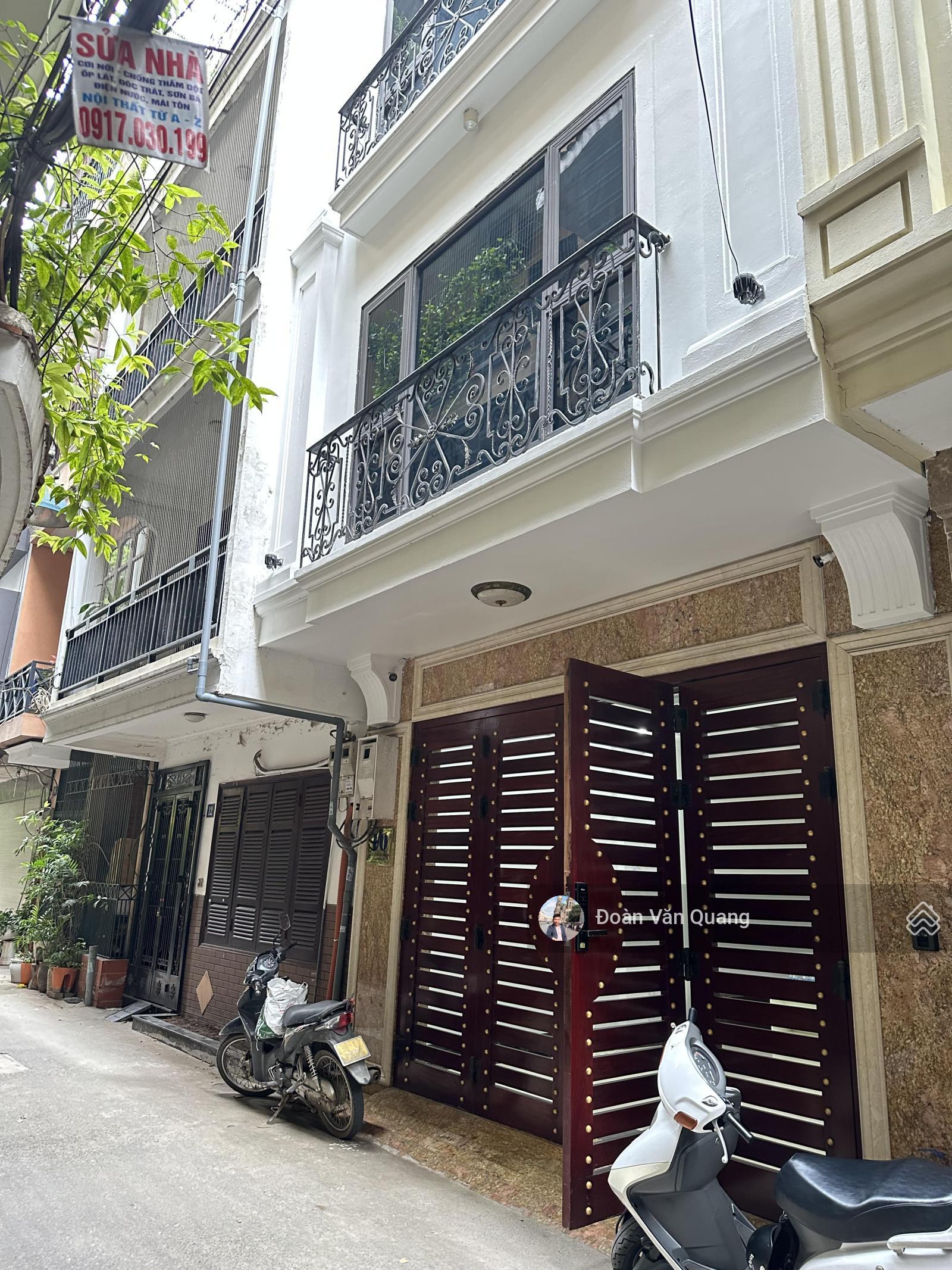 Nhà mặt ngõ Hào Nam, Đống Đa 40m² giá 11 tỷ - Thiết kế hiện đại, thang máy, kinh doanh thuận lợi!