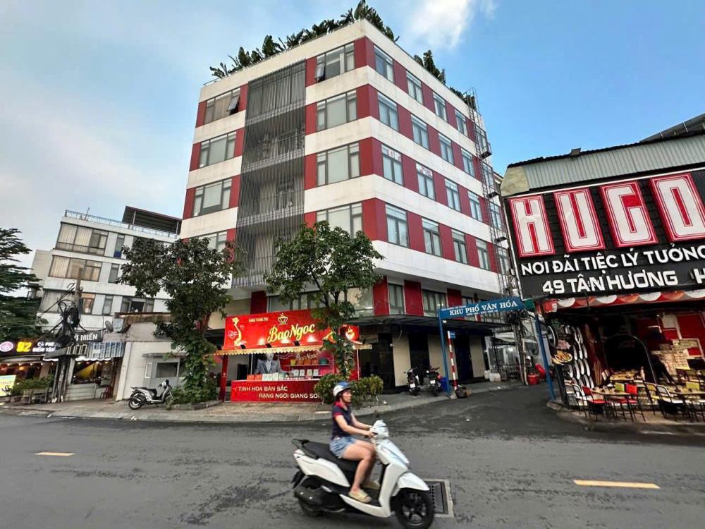 Tòa nhà văn phòng mặt tiền Tân Hương 240m² giá 65 tỷ - Góc 2 mặt tiền thuận lợi kinh doanh!
