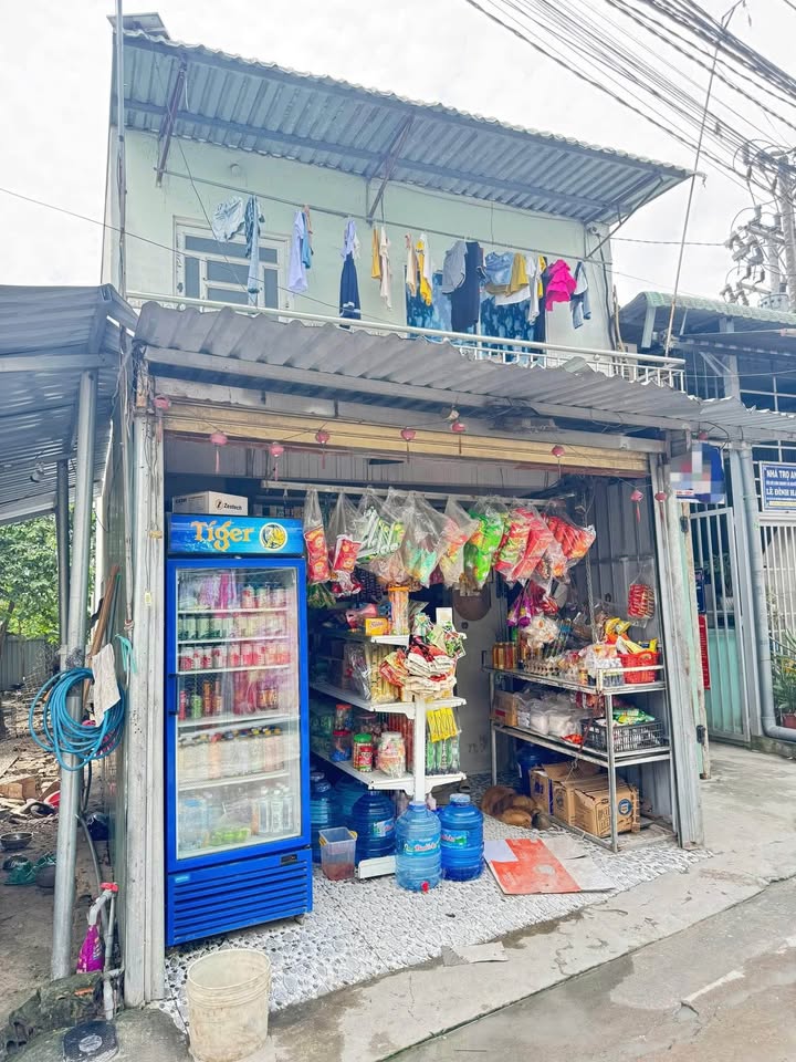 Nhà lầu trệt + 9 phòng trọ tại Khánh Bình, Dĩ An, 265m² - Đầu tư sinh lời tốt!