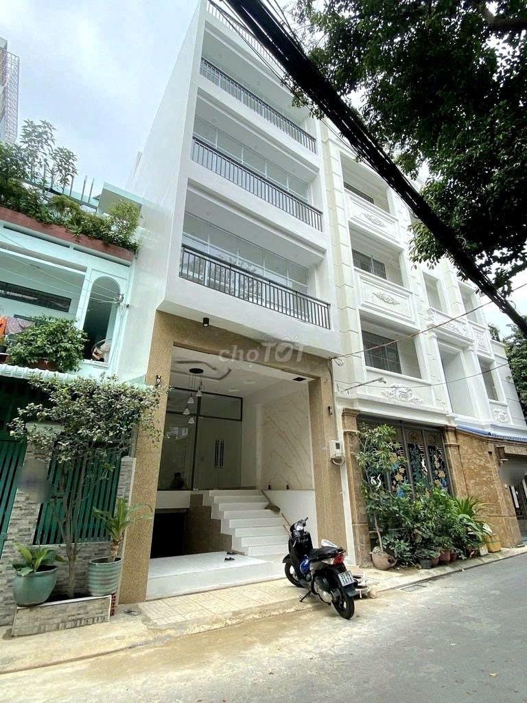 Nhà cho thuê mặt tiền 42A Nguyễn Minh Hoàng, 100m² - Thích hợp làm văn phòng và spa!