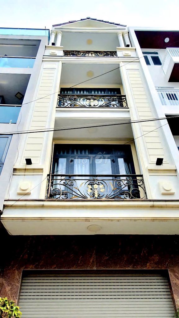 Nhà cho thuê mặt tiền Phan Đăng Lưu 90m² giá 36 triệu - Thang máy hiện đại, tiện ích đầy đủ!