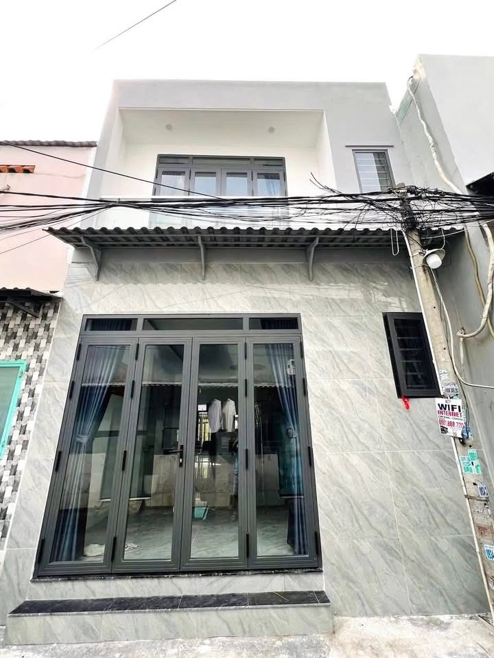 Nhà 1 trệt 1 lầu Tân Phú Q9 50m² giá 5.65 tỷ - Full nội thất, hẻm ô tô!