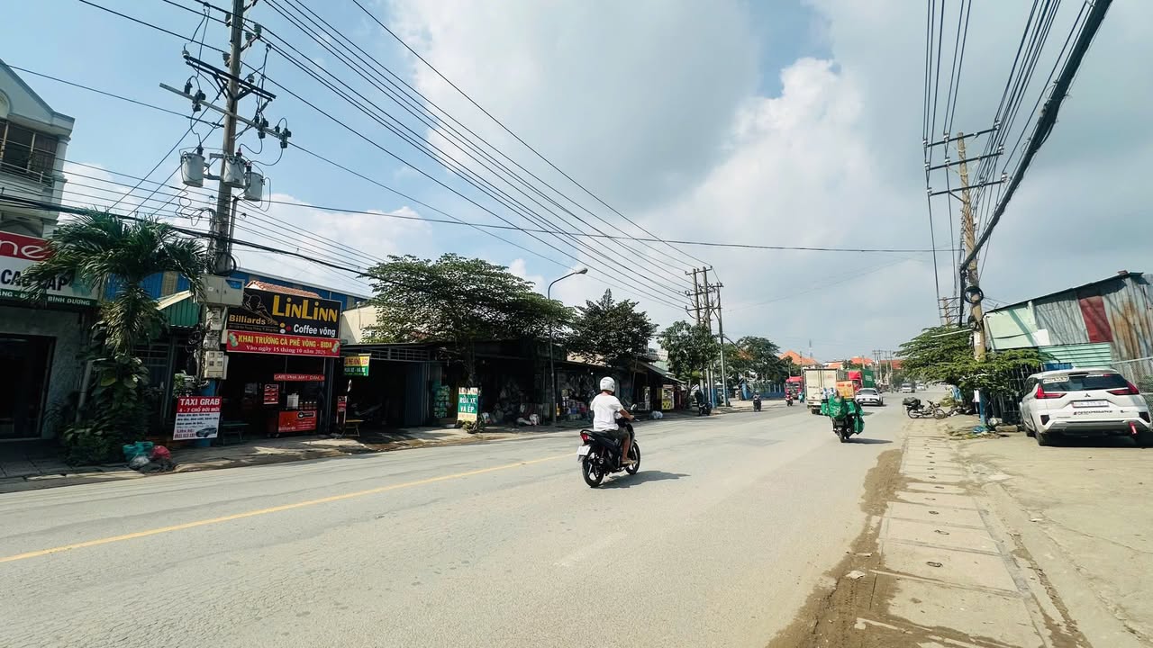 Nhà mặt tiền kinh doanh Dĩ An 66.6m² giá 6.5 tỷ - Kinh doanh thuận lợi gần chợ Bình An!