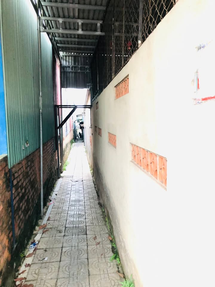 Bán nhà mặt tiền Nguyễn Huệ, Đồng Xoài 415m² giá 3.95 tỷ - Thu nhập ổn định từ 12 phòng trọ!