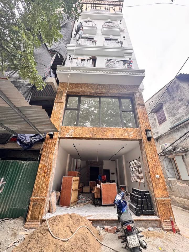 Bán nhà mặt ngõ ô tô tránh Cổ Nhuế, 50m², 7 tầng thang máy - Đầu tư kinh doanh hiệu quả!