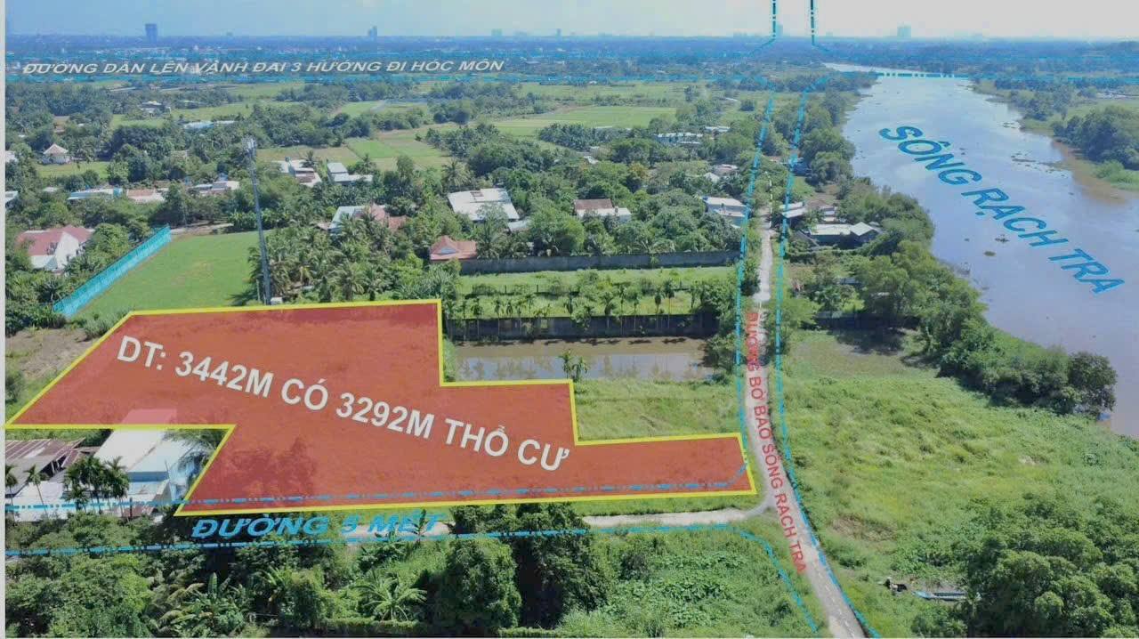 Đất nền Bình Mỹ Củ Chi 3443m² giá 25 tỷ - Mặt tiền sông Rạch Tra thoáng mát!
