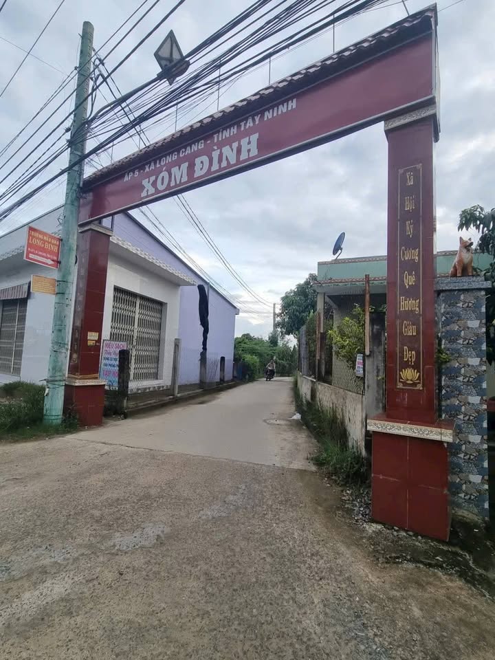 Nhà cấp 4 mặt tiền Kênh, Long Định 203m² giá 1.8 tỷ - Sát trường học