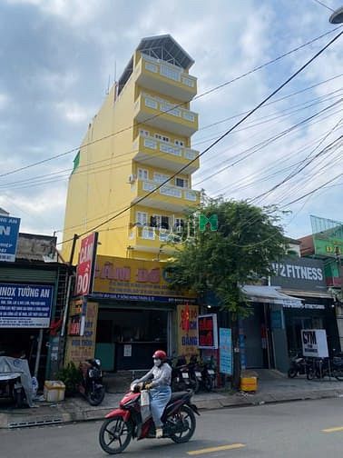 Bán nhà mặt tiền Nguyễn Văn Quá Quận 12 - 6 tầng - 5m x 30m - 19 tỷ
