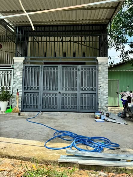 Nhà cấp 4 gác lửng 60m² Tân Uyên chỉ 1.25 tỷ - Gần chợ Thái Hòa!