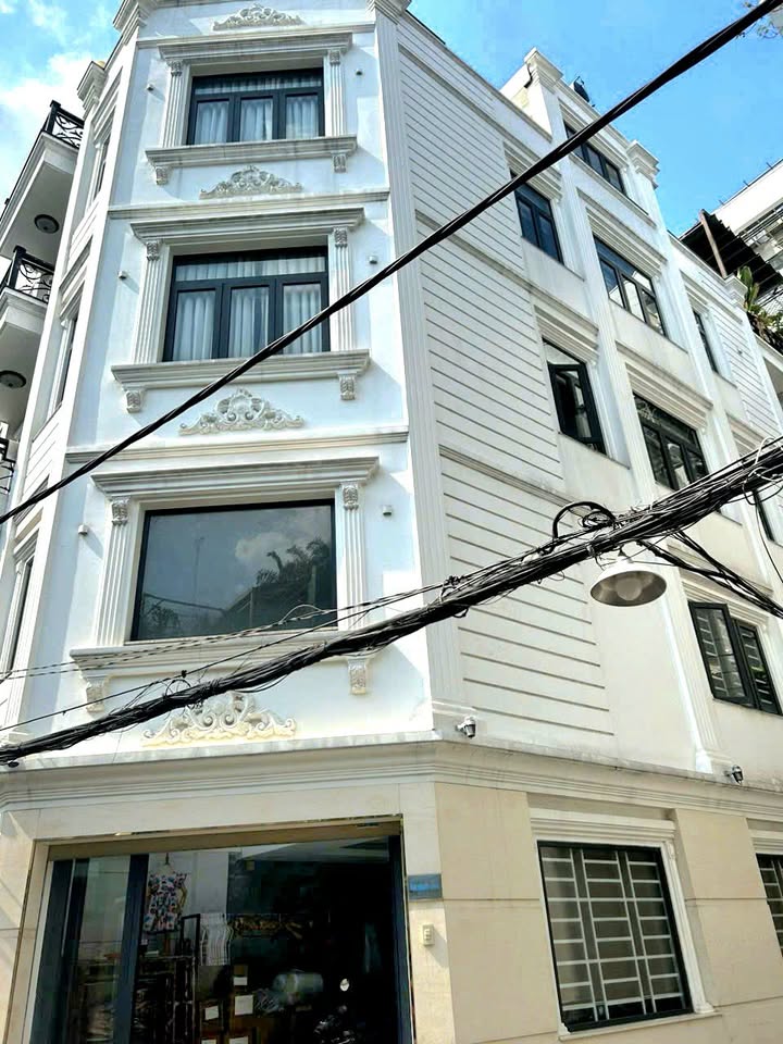 Nhà HXH 7m Lạc Long Quân, Tân Bình 105m² giá 15.6 tỷ - Đầu tư sinh lời tuyệt vời!