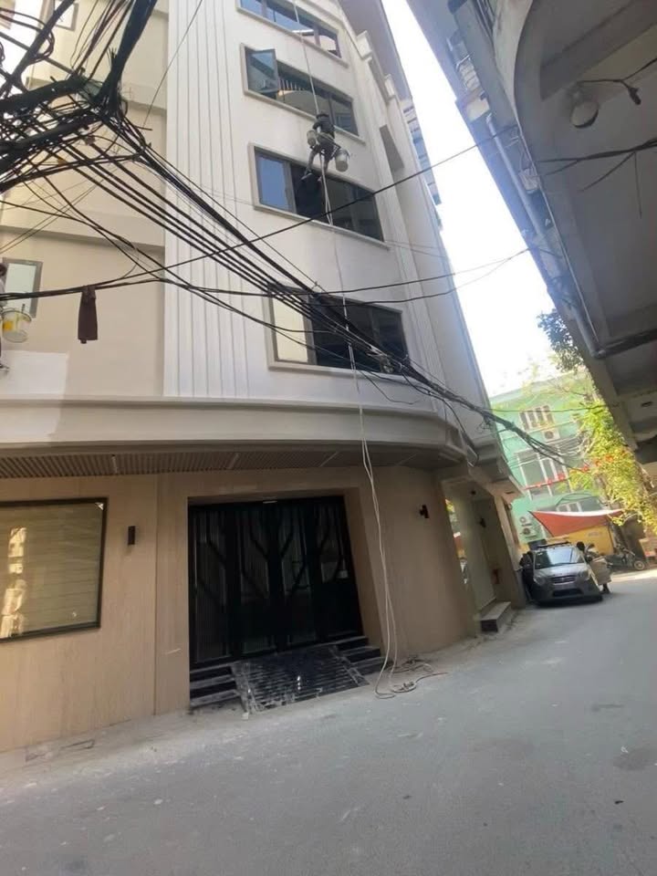 Nhà mặt phố Nguyễn Trãi, Đống Đa 60m² giá 32.5 tỷ - Lô góc ô tô tránh nhau, dòng tiền 100 triệu/tháng!