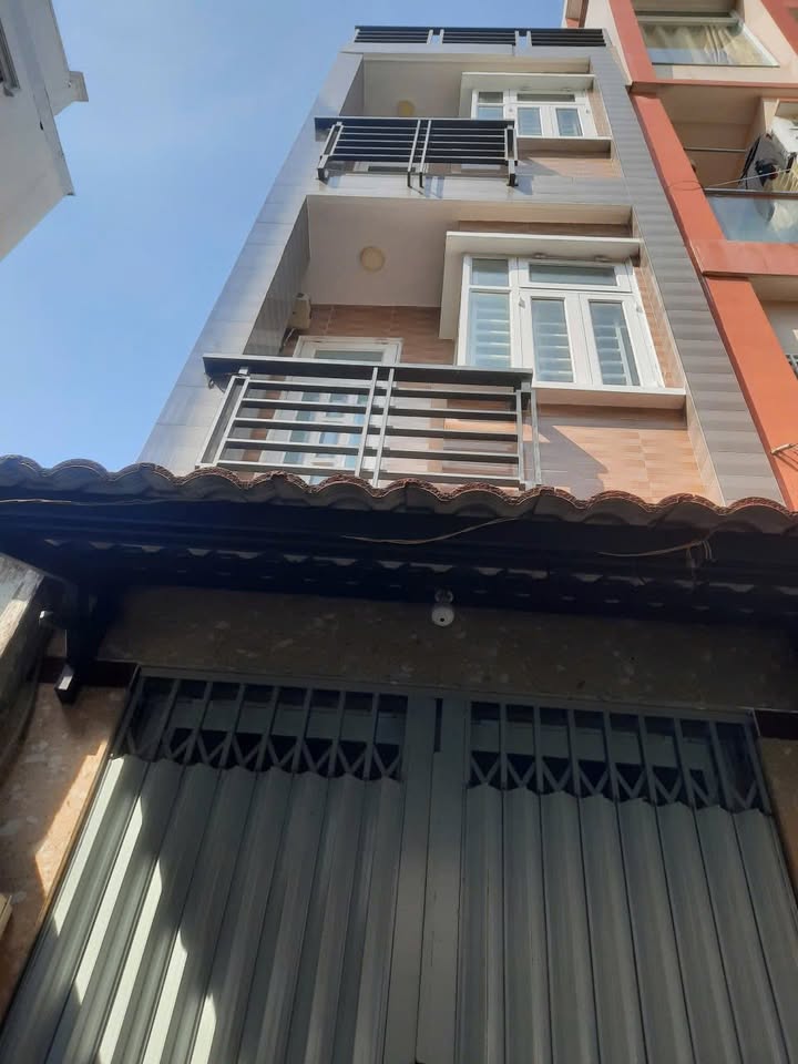 Nhà bán Tôn Đản, quận 4, 21m² giá 3 tỷ - Sổ hồng chính chủ, thương lượng ngay!