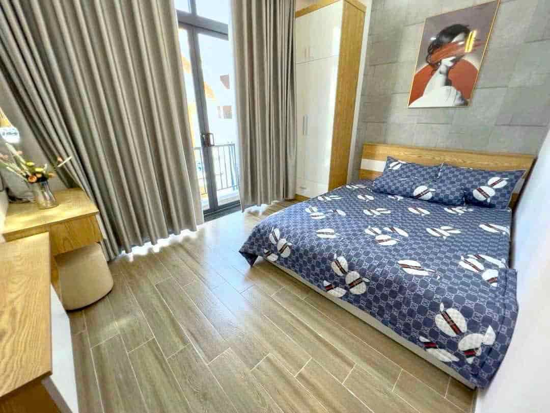 Bán nhà chính chủ 1 trệt 2 lầu An Phú Đông 50,4m² giá 1,65 tỷ - Hẻm xe hơi rộng rãi!