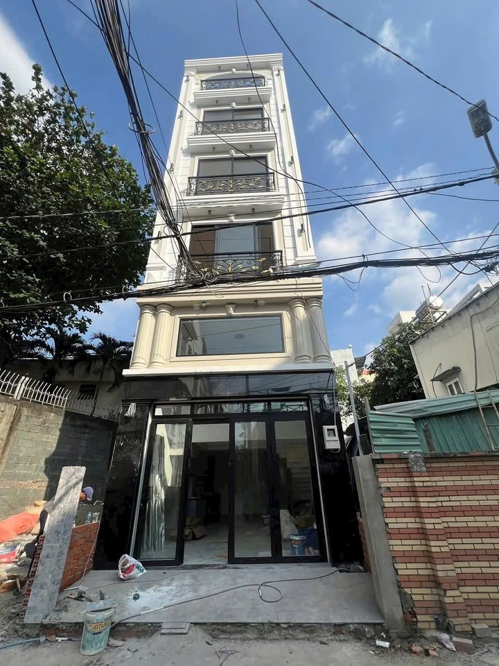 Nhà mới 100% đường Nơ Trang Long 38m² giá 13.8 tỷ - Thang máy tiện nghi!