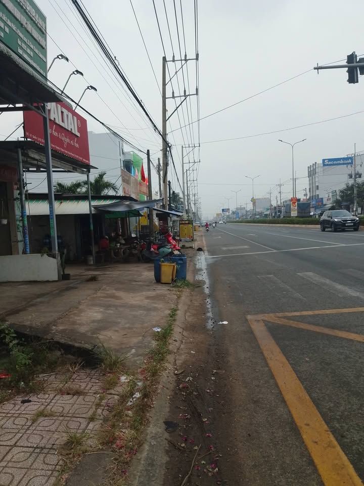 Nhà mặt tiền Quốc lộ 13, Hưng Long, 100m² - Kinh doanh sầm uất!