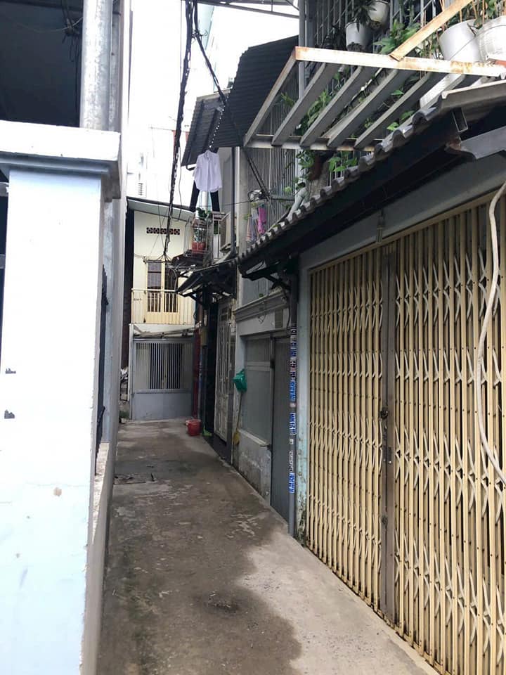 Nhà hẻm Tân Phú Quận 7 24m² giá 2.4 tỷ - Sổ hồng riêng, hoàn công đầy đủ!