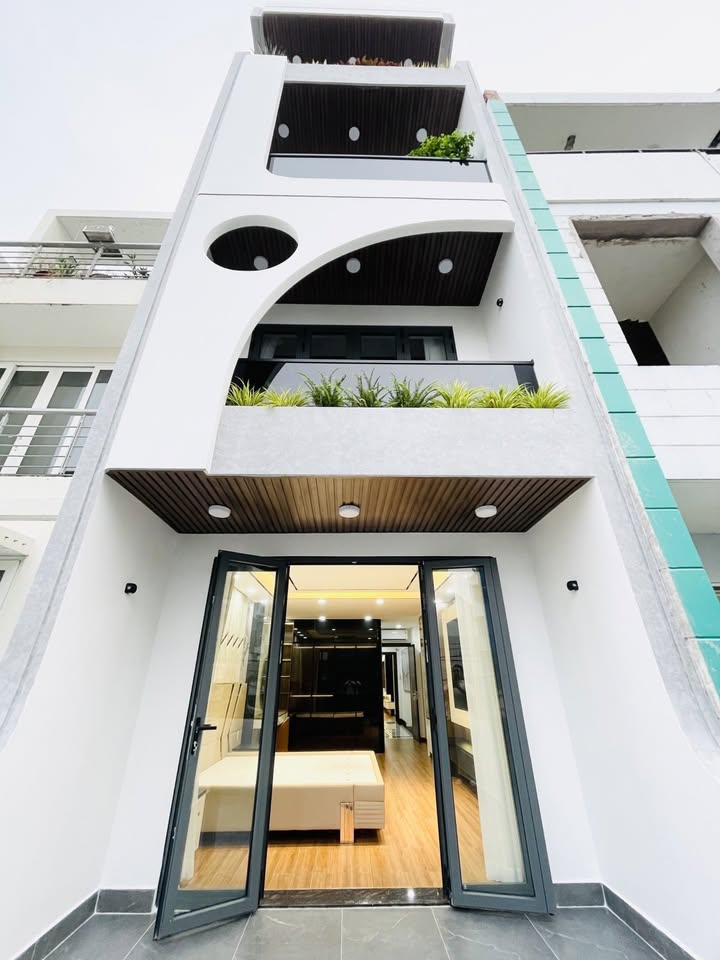 Nhà phố Cư Xá Ngân Hàng quận 7, 100m² giá 21.99 tỷ - Mặt tiền sang trọng, thang máy xịn!