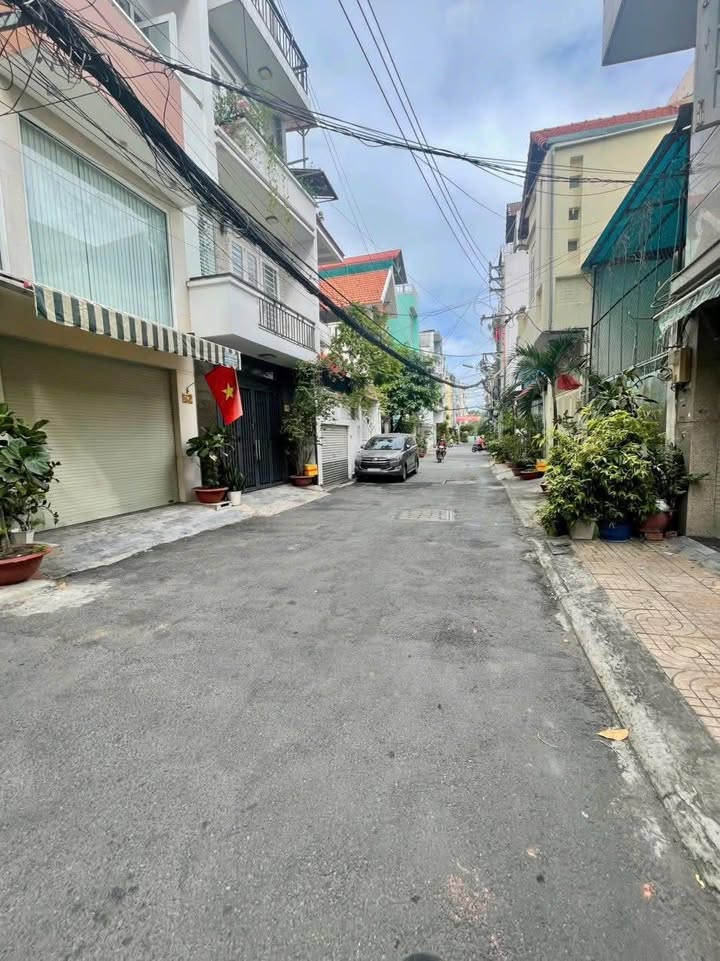 Bán nhà góc 2 mặt tiền hẻm xe hơi đường Hoàng Văn Thụ, Phú Nhuận 100m² - Đầu tư sinh lời ngay!