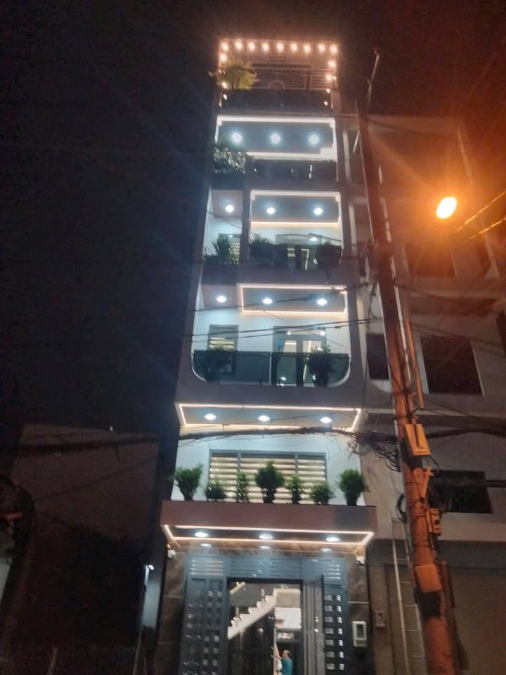 Nhà mặt tiền Cầu Ba Phụ Q12 84m² giá 10.9 tỷ - Sổ riêng, thang máy, full nội thất