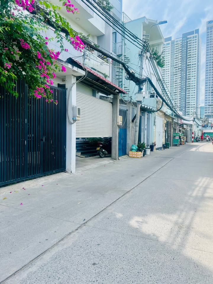 Nhà phố Quận 7 64m² giá 6 tỷ - Hẻm xe hơi 2 mặt tiền tiện xây mới!