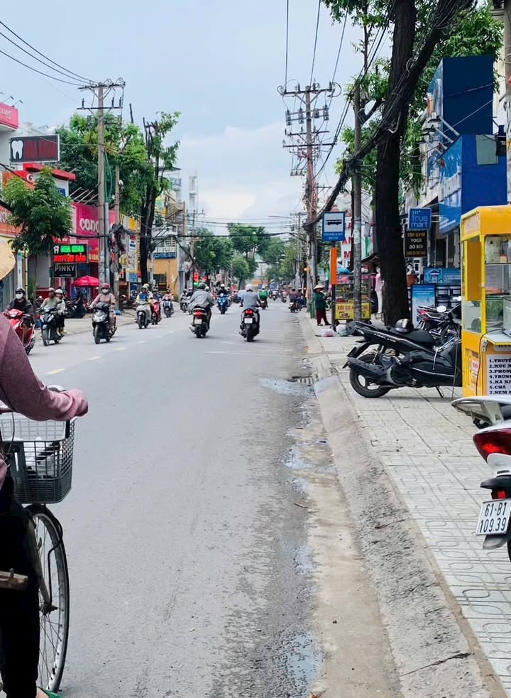 Nhà góc 2 mặt tiền Lê Văn Thọ, Gò Vấp 100m² giá 27 triệu - Kinh doanh nổi bật!