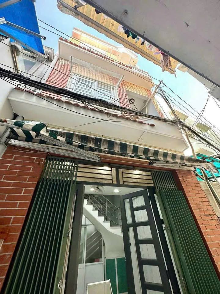 Nhà cho thuê Bùi Đình Túy 32m² giá 13 triệu - Không gian thoáng đãng, tiện nghi đầy đủ!