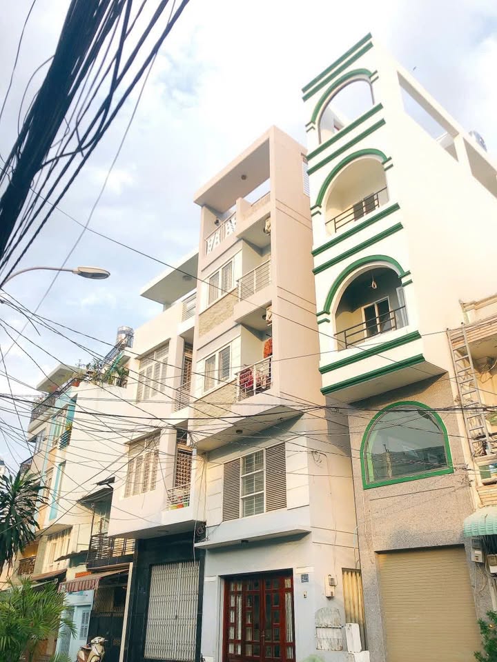 Bán nhà mặt tiền quận 4 - 26m² giá 7.45 tỷ - Kinh doanh thuận lợi!