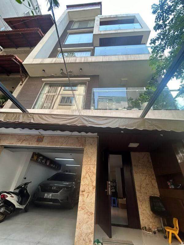 Nhà lô góc Chùa Láng 121m² giá 43.8 tỷ - Gara ô tô, kinh doanh sinh lời