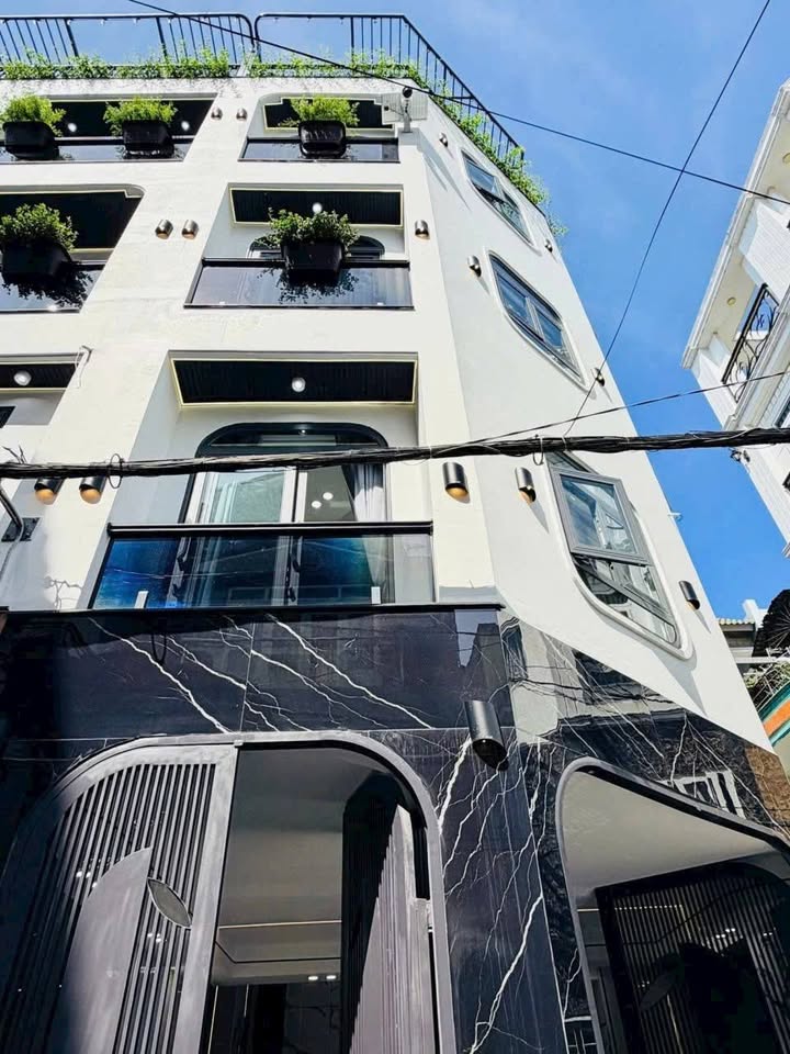 Nhà 5 tầng đường Huỳnh Văn Nghệ, Gò Vấp 36.1m² giá 7.99 tỷ - Thiết kế hiện đại, tặng nội thất!