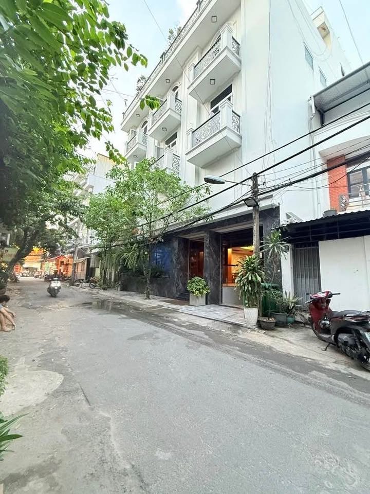 Căn hộ dịch vụ 3 tầng Phạm Văn Bạch 104m² giá 11.9 tỷ - Đầu tư sinh lời ngay!