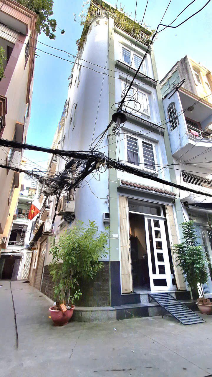 Nhà 5 tầng hẻm ô tô Trần Hưng Đạo, Q1 93m² giá 7.9 tỷ - Đầu tư sinh lời ngay!