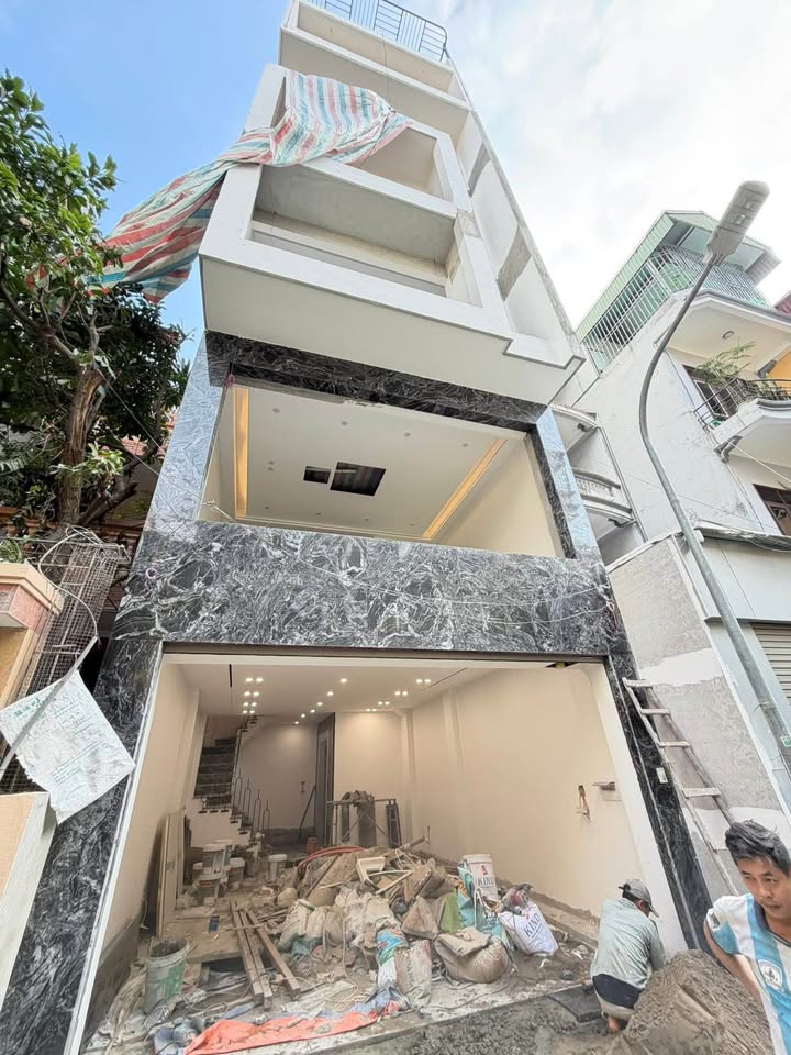 Nhà 7 tầng Ngõ 548 Nguyễn Văn Cừ, 50m² giá 24.8 tỷ - Thiết kế hiện đại, đầy đủ nội thất!