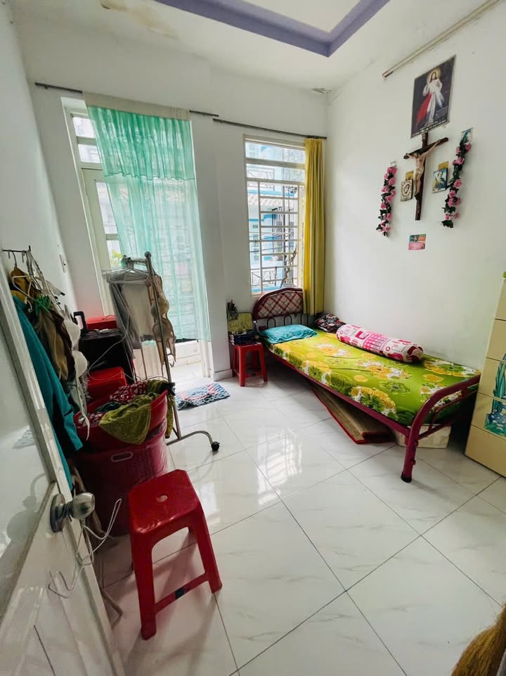 Nhà phố Thới An Quận 12 21m² giá 1.65 tỷ - Sổ hồng chung, tiện nghi đầy đủ!