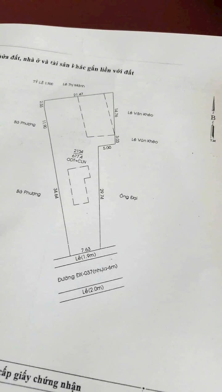 Đất mặt tiền ĐX 037, Khu Phố Phú Mỹ 1, 677m² giá 11 tỷ - Nhà cấp 4 tặng kèm!
