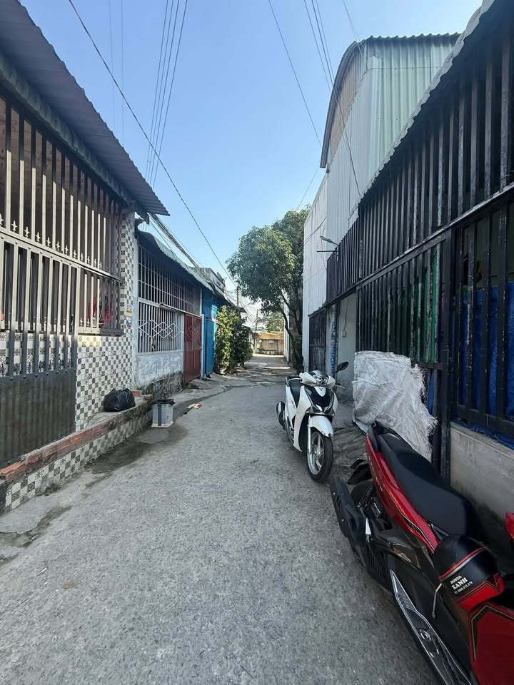 Nhà 2 mặt tiền Tân Phước Khánh 60m² giá 1.15 tỷ - Sổ chung chính chủ!