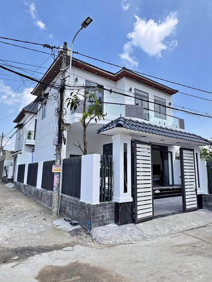 Nhà bán Hóc Môn 60m² giá 390 triệu - Sổ hồng riêng, tiện ích xung quanh!