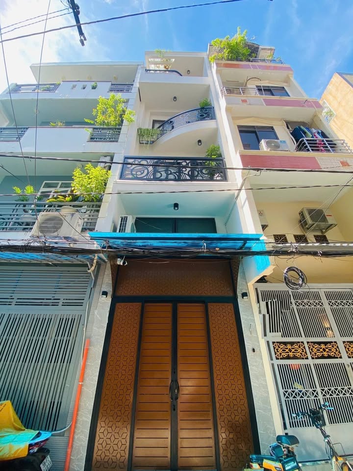 Nhà phố 4 tầng đường Xóm Đất, quận 11, diện tích 40m² giá 6.5 tỷ - Full nội thất sang trọng!