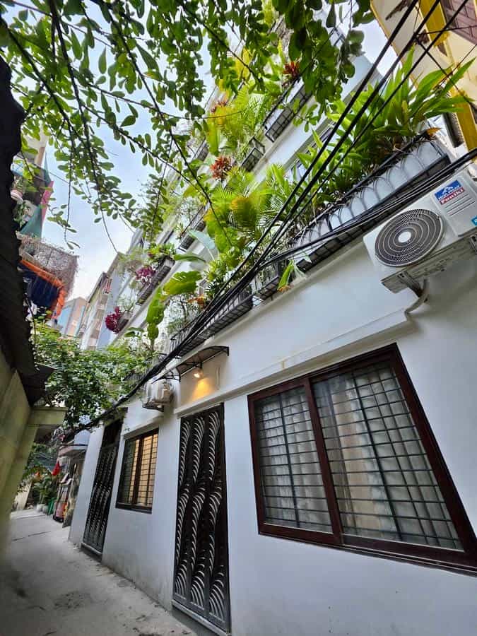 Bán nhà Trần Duy Hưng, Cầu Giấy, 49m², Lô Góc, 5 Tầng Thang Máy - Chỉ 12,9 Tỷ!