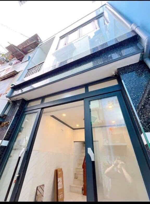 Nhà đẹp quận 4 26m² giá 3.1 tỷ - Khu dân cư an ninh, gần chợ