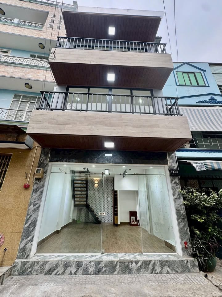 Nhà mới 3 tầng đường Âu Cơ, Quận 11, 30m² giá 6.88 tỷ - Kinh doanh sầm uất!