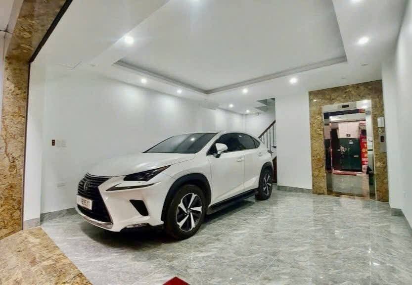 Nhà 8 tầng Hồ Tùng Mậu 49m² giá 14.4 tỷ - Kinh doanh đỉnh, ô tô vào nhà!